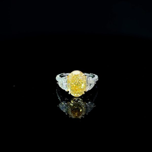 3 Stone Fancy Yellow Diamond Ring